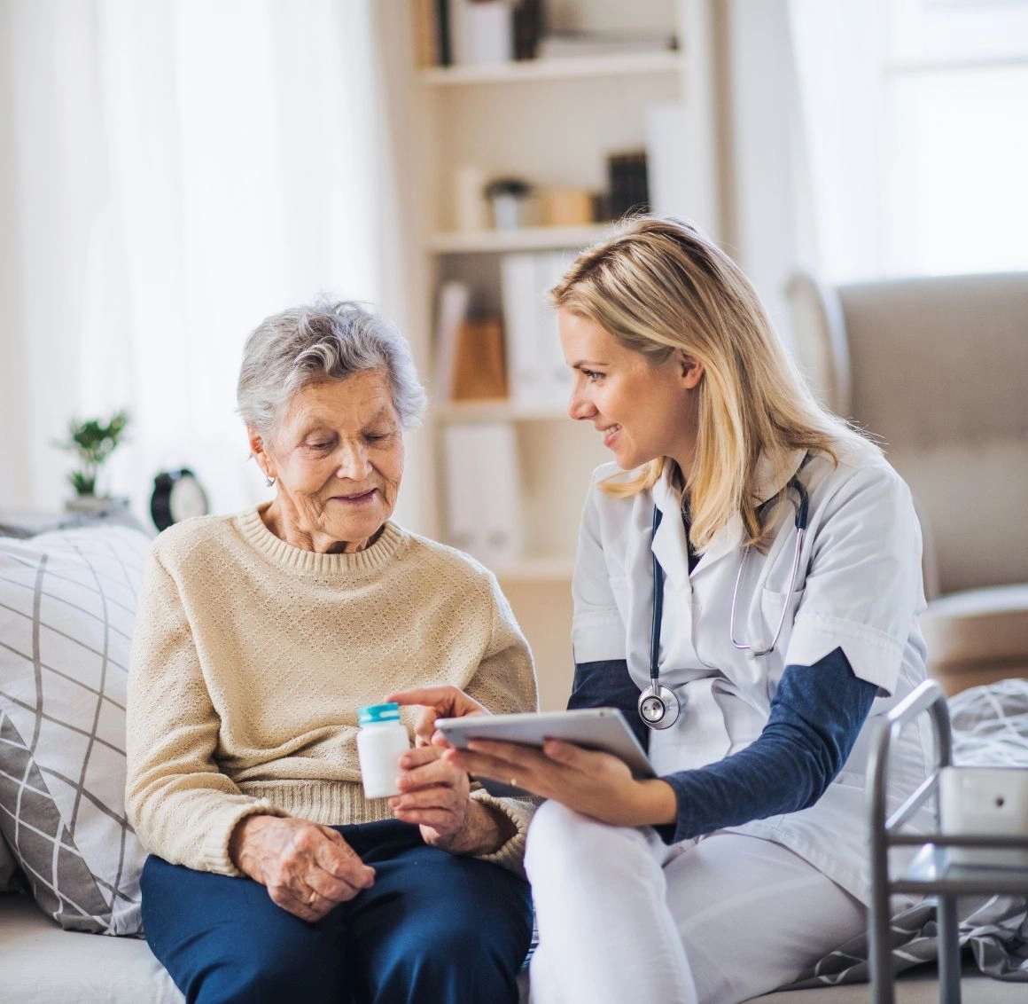 caregiver assisting with medication supervision caregiver assisting with medication supervision